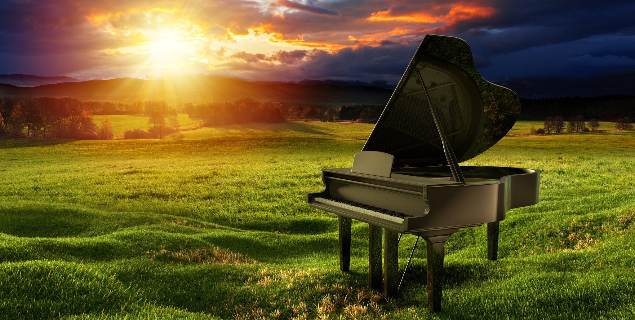 Piano in a field at sunrise